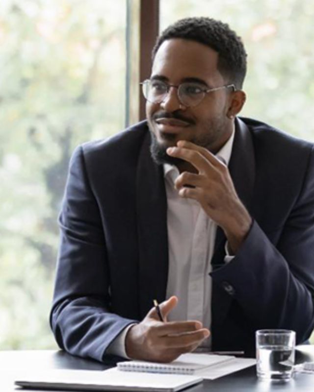 Corporate professionals in meeting room