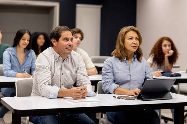 Group of people paying attention at a training