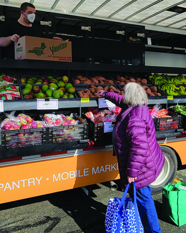 Volunteers at Mobile Market